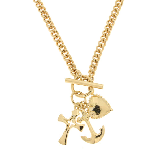 Gold chain necklace with a toggle clasp and three decorative charms: a cross, an anchor, and a heart.