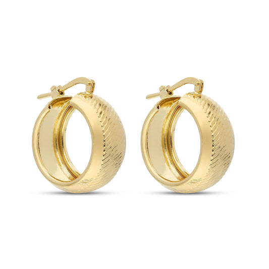 A stylish pair of gold-tone hoop earrings featuring a unique textured surface. The earrings have a rounded shape with a slightly raised design that adds dimension. The polished gold finish contrasts beautifully with the intricate patterns, creating a sophisticated and elegant look. These earrings are designed with a secure clasp for easy wear, making them an eye-catching accessory suitable for various occasions.