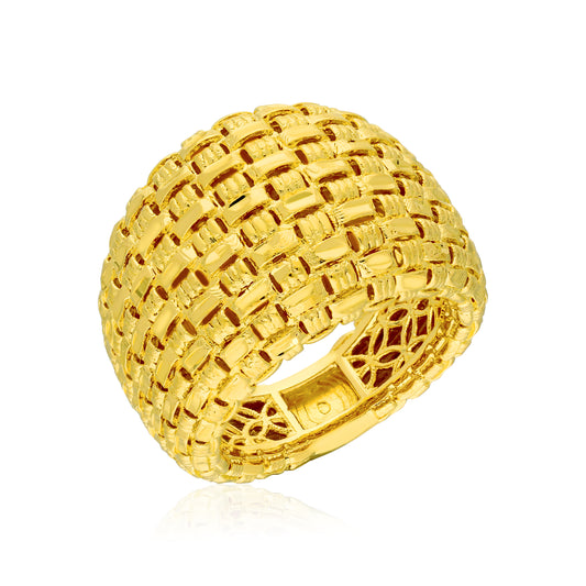 A striking gold ring designed with an intricate woven texture that gives it a luxurious appearance. The ring's surface features a grid-like pattern, created by alternating raised and recessed sections, which enhances its dimensionality. This piece is bold yet elegant, making it a standout accessory for any outfit.